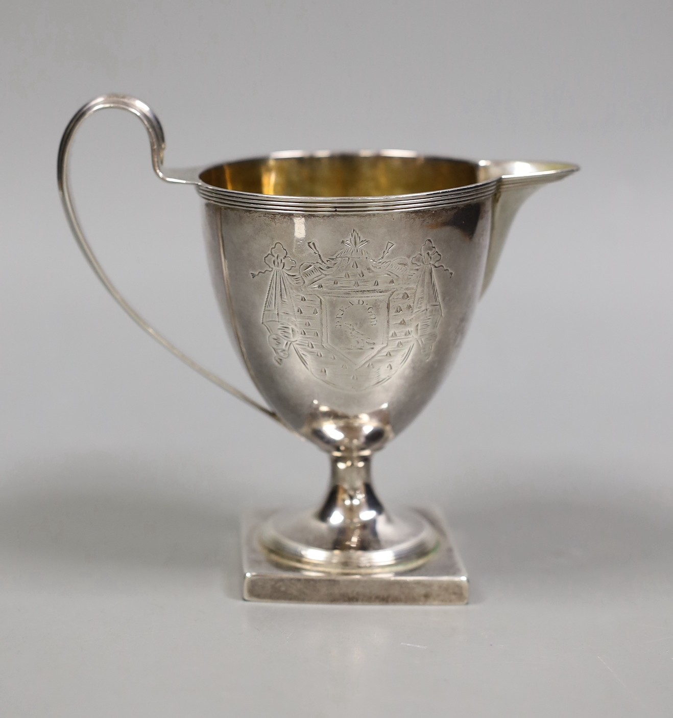 A George III silver pedestal cream jug, Henry Chawner, London, 1788, height 12.5cm, 5.8oz.